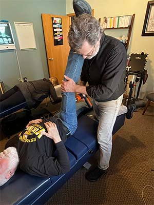 Chiropractor Grand Rapids MI John Owings Leg Adjustment
